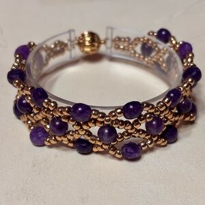 Handcrafted Amethyst Beaded Bracelet with Gold Tone Clasp and accents. 7 inches